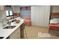 Double use studio with its own bathroom, kitchen and two… - Апартмани/Станови