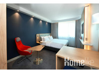 Business Suite + Sofabett en Apart Hotel - Pisos