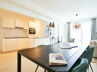 Central Geneva Apartment with Modern Amenities - Apartments