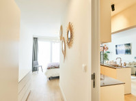 Central Geneva Apartment with Modern Amenities - Apartments