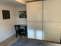 Stylish, cozy 2 room apartment with patio and parking space - דירות