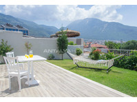Furnished Detached House with 4 Bedrooms in Fethiye Ovacik - Жилье