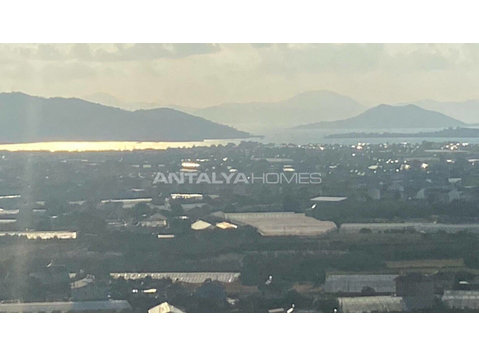Panoramic Sea View Land with Construction Permit in Fethiye - Mājokļi
