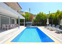 Spacious House with 3 Bedrooms and 3 Bathrooms in Fethiye - Жилище
