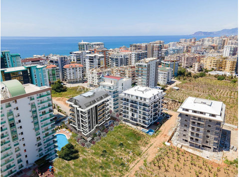 Apartments in Walking Distance from Beach in Mahmutlar… - Housing