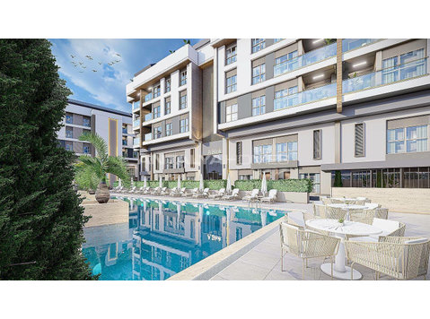 Apartments in a Complex with Parking Lot in Konyaalti… - اسکان