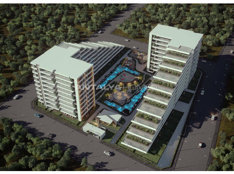Apartments with Garden Use in a Complex in Antalya Altintas - السكن