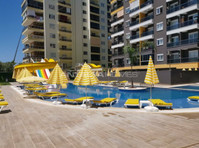 Central Flats 300 mt to the Sea in Mahmutlar Alanya - Housing
