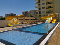 Central Flats 300 mt to the Sea in Mahmutlar Alanya - Housing