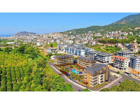 Chic Flats in a Complex with Swimming Pools in Oba Alanya - السكن