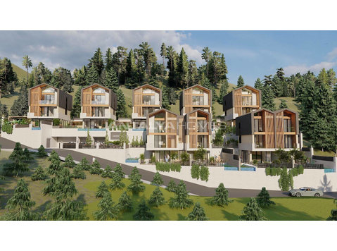 Detached Houses with Sea Views and Pools in Alanya Tepe - Bostäder
