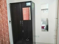 Closed Partition Room with Private Balcony, and Sharing Bath - Apartemen