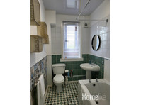 Lovely 4 Bedroom Apartment with 8 Separate Beds - דירות