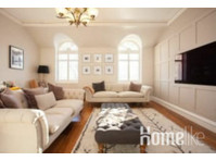 Trendy and Spacious Flat in West End - דירות