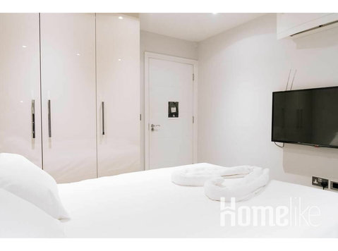 Mooie tweepersoonskamer met airconditioning bij Baker Street - Appartementen