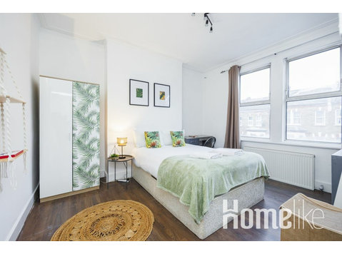 Grand Comfy apartamento de 2 habitaciones con servicios… - Pisos