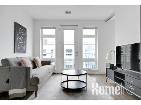 Luxe 2B w/ W/D, Gym, Rooftop. Steps from T stop - Apartments